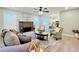 Spacious living room with stone fireplace, hardwood floors, and comfy seating at 430 Thornbush Trce, Lawrenceville, GA 30046