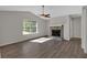 Living room with fireplace and vinyl plank flooring at 3438 Huntington Ct, Douglasville, GA 30134