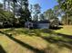 Ranch home with a large backyard and mature trees at 692 Chandler Dr, Lawrenceville, GA 30044