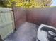 Private patio with brick walls and AC unit at 3541 Old Chamblee Tucker Rd # G, Atlanta, GA 30340