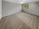 Bright bedroom featuring neutral walls and plush carpeting at 3541 Old Chamblee Tucker Rd # G, Atlanta, GA 30340