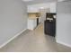 Kitchen with white cabinets and black appliances at 3541 Old Chamblee Tucker Rd # G, Atlanta, GA 30340