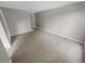 Living room with neutral carpeting and staircase access at 3541 Old Chamblee Tucker Rd # G, Atlanta, GA 30340