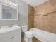 Clean bathroom with a shower/tub combo and updated vanity at 3541 Old Chamblee Tucker Rd # G, Atlanta, GA 30340