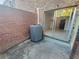 Private patio with access to the unit and AC unit at 3541 Old Chamblee Tucker Rd # G, Atlanta, GA 30340