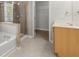 Bathroom features a shower, garden tub and walk-in closet at 911 Queensbrooke Way, Mableton, GA 30126