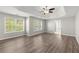 Large main bedroom with hardwood floors, tray ceiling and lots of natural light at 911 Queensbrooke Way, Mableton, GA 30126