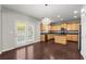 Eat-in kitchen with island, stainless steel appliances, and dark countertops at 911 Queensbrooke Way, Mableton, GA 30126