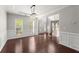 Formal dining room with hardwood floors and wainscoting at 911 Queensbrooke Way, Mableton, GA 30126
