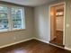 Bright dining room with hardwood floors and view into kitchen at 411 Greencove Se Ln, Atlanta, GA 30316