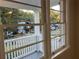 Window view of front porch and residential street at 411 Greencove Se Ln, Atlanta, GA 30316