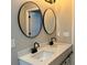 Bathroom with double vanity and large mirrors at 411 Greencove Se Ln, Atlanta, GA 30316