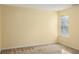 Well-lit bedroom with a window and neutral walls at 350 Wilma Sw Ct, Atlanta, GA 30331