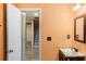 Small bathroom with vanity and access to stairs at 350 Wilma Sw Ct, Atlanta, GA 30331