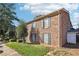 Brick building exterior with green shutters at 5560 Kingsport Dr # 27, Atlanta, GA 30342