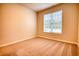 Bright bedroom with neutral carpeting and window blinds at 960 Park Place St, Social Circle, GA 30025