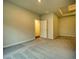 Bright bedroom with carpet, window and access to closet at 960 Park Place St, Social Circle, GA 30025