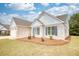 Brick ranch home with attached garage and landscaping at 960 Park Place St, Social Circle, GA 30025