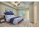Main bedroom with a large bed and window, and a walk-in closet at 960 Park Place St, Social Circle, GA 30025