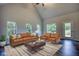 Spacious living room with hardwood floors and ample natural light at 960 Park Place St, Social Circle, GA 30025