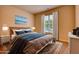 Charming bedroom with a queen bed and neutral color palette at 960 Park Place St, Social Circle, GA 30025