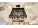 Stainless steel gas range with granite countertop at 960 Park Place St, Social Circle, GA 30025