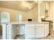 Kitchen island with granite countertop and stainless steel sink at 960 Park Place St, Social Circle, GA 30025