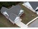 An aerial view of a single Gathering home with grey roof and attached garage at 960 Park Place St, Social Circle, GA 30025