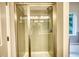 Walk-in shower with tile surround at 960 Park Place St, Social Circle, GA 30025