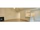 Open concept living room with kitchen views and vaulted ceiling at 960 Park Place St, Social Circle, GA 30025