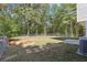 Backyard with raised garden bed and wooded area at 4012 Union Church Sw Rd, Stockbridge, GA 30281