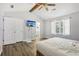 Spacious primary bedroom with high ceilings, lots of natural light and ensuite bathroom at 4012 Union Church Sw Rd, Stockbridge, GA 30281