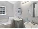 Bathroom with double vanity, a soaking tub and updated fixtures at 4012 Union Church Sw Rd, Stockbridge, GA 30281