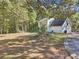 House exterior showcasing a backyard with fence at 4012 Union Church Sw Rd, Stockbridge, GA 30281