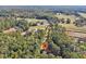 Aerial view of house on large lot, close to other homes at 4012 Union Church Sw Rd, Stockbridge, GA 30281