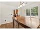 Dining room with hardwood floors and a view of the kitchen at 4012 Union Church Sw Rd, Stockbridge, GA 30281