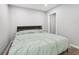 Guest bedroom with a queen bed and an adjacent bathroom at 4012 Union Church Sw Rd, Stockbridge, GA 30281
