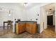 Kitchen with a corner cabinet and access to the dining area at 4012 Union Church Sw Rd, Stockbridge, GA 30281