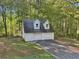 Detached two-car garage with dormer windows at 4012 Union Church Sw Rd, Stockbridge, GA 30281