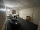 Finished basement area with seating and storage at 220 Spalding Lake Pl, Atlanta, GA 30350