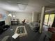 Finished basement with multiple functional areas at 220 Spalding Lake Pl, Atlanta, GA 30350
