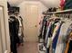 Large walk-in closet with ample shelving and hanging space at 220 Spalding Lake Pl, Atlanta, GA 30350