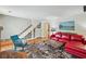 Open living space with a fireplace, built-in bookcase, and hardwood floors at 1053 Riverbend Club Se Dr, Atlanta, GA 30339