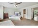 Main bedroom with a king-size bed and en-suite bathroom access at 1053 Riverbend Club Se Dr, Atlanta, GA 30339