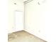 Cozy bedroom with neutral walls and carpet at 32 Peachtree Nw St # 1006, Atlanta, GA 30303