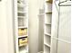 Large walk-in closet with shelving and hanging rods at 32 Peachtree Nw St # 1006, Atlanta, GA 30303