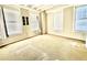 Large bedroom with neutral walls and plush carpeting at 32 Peachtree Nw St # 1006, Atlanta, GA 30303