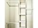 Well-organized closet with hanging rods and shelves at 32 Peachtree Nw St # 1006, Atlanta, GA 30303