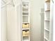 Spacious closet with built-in shelves and hanging rods at 32 Peachtree Nw St # 1006, Atlanta, GA 30303