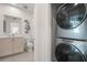 Modern bathroom with stackable washer and dryer at 201 New St # 2201-9, Decatur, GA 30030